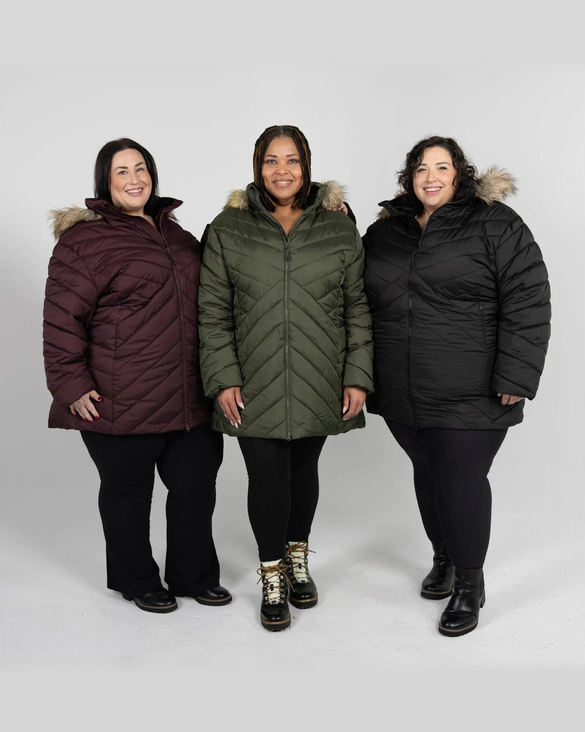 The Axtell plus size hooded winter parka, sizes 1X to 6X, worn by three models in Eggplant, Hunter Green and Black