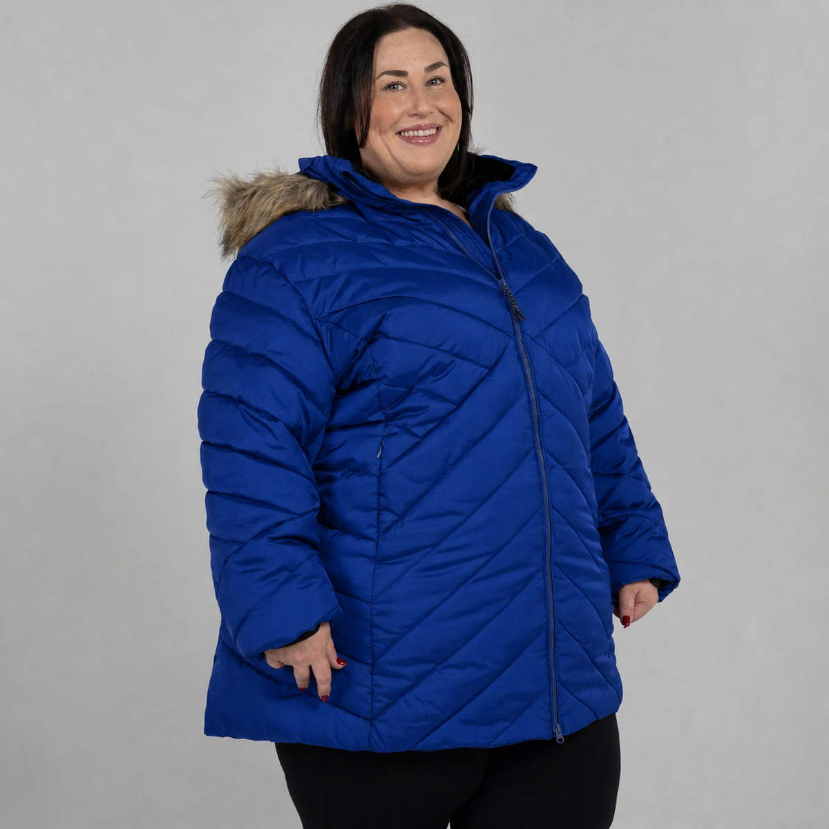 Midnight Blue Axtell plus size parka, sizes 1X to 6X, front angle on model
