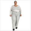 Woman wearing gray packable rain pants and a white top, plus size 1X-6X comfort