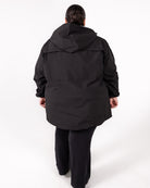 Plus size 804 rain jacket black 2 | Model is 5'3" and wears a 5X