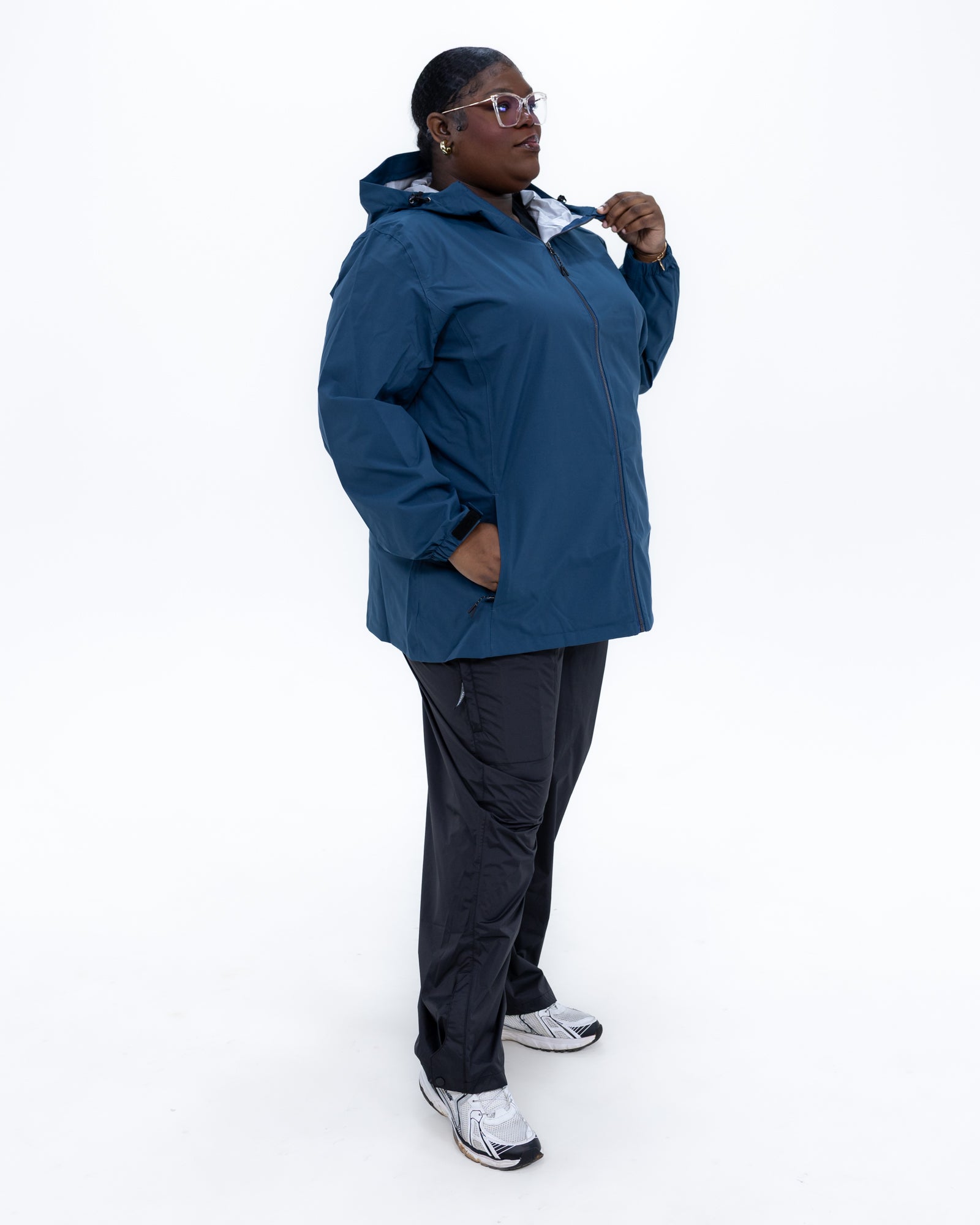 Plus size 804 rain jacket teal 3 | Model is 5'9" and wears a 3X