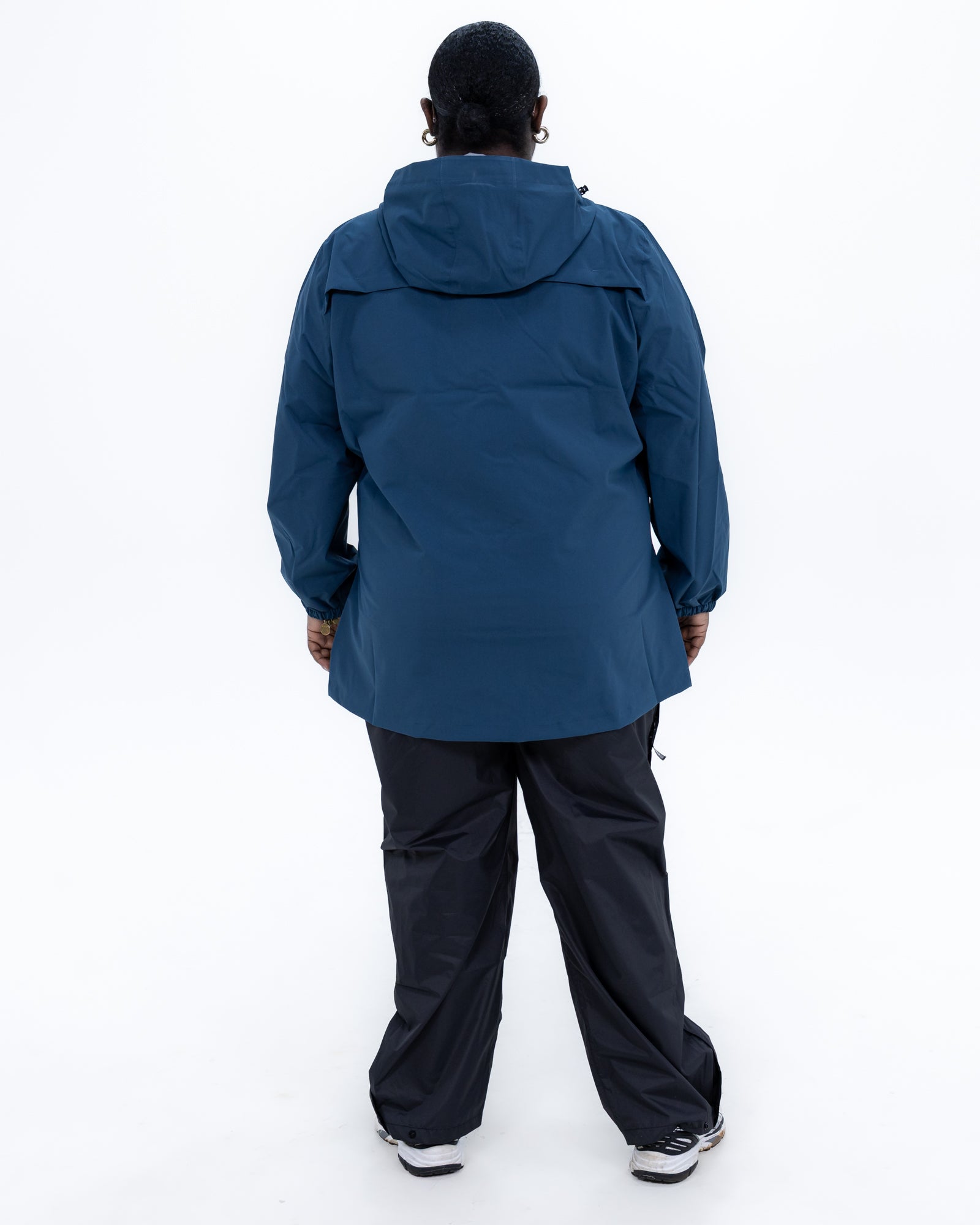 Plus size 804 rain jacket teal 4 | Model is 5'9" and wears a 3X