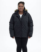 Black women's plus size Aspen ski jacket, front full | Model is 5'6" and wears a 1X