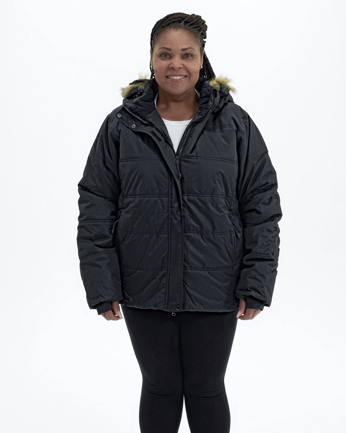 Black women's plus size Aspen ski jacket, front full | Model is 5'6" and wears a 1X