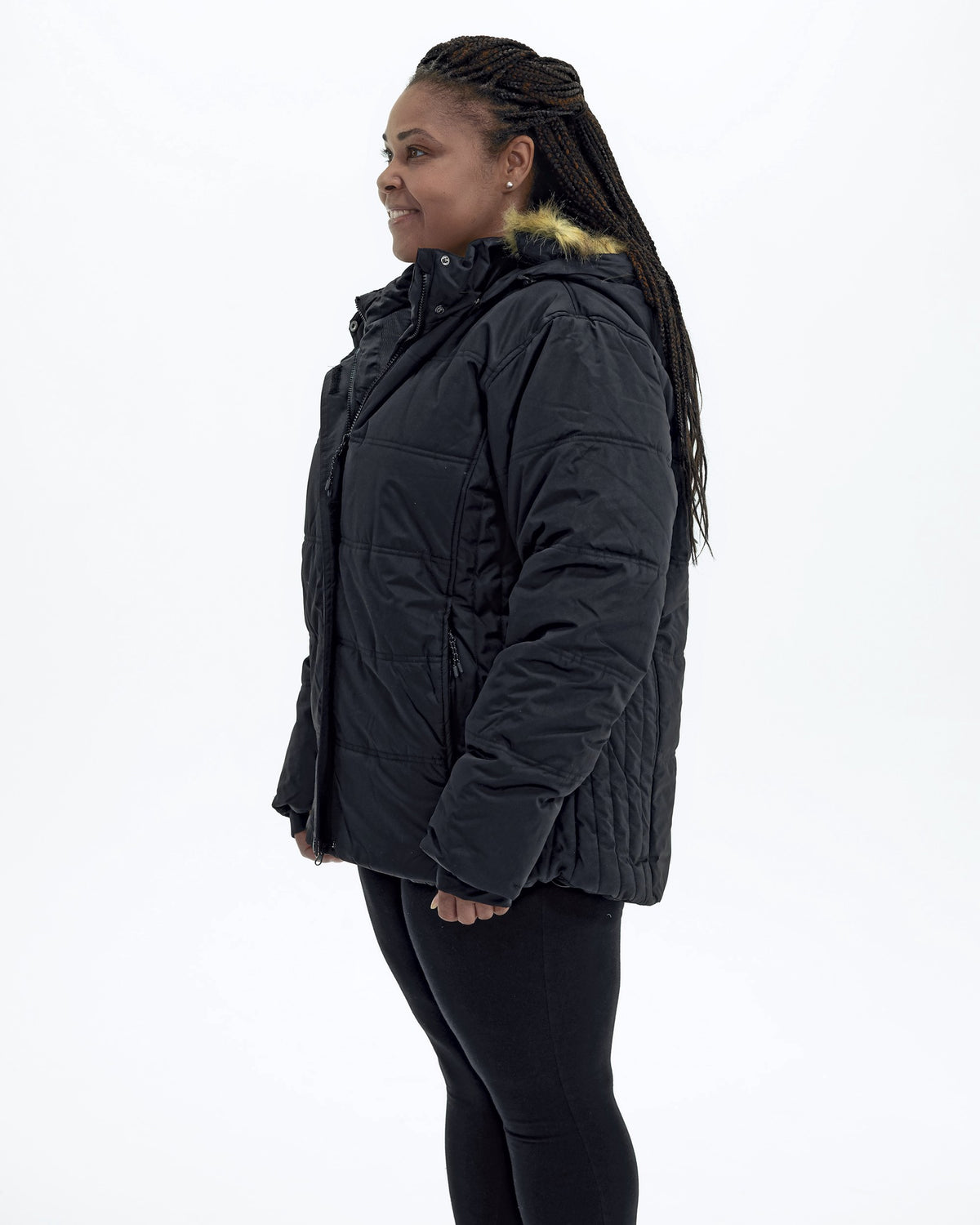Black women's plus size Aspen ski jacket, side | Model is 5'6" and wears a 1X