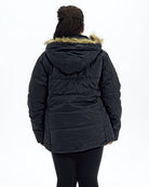 Black women's plus size Aspen ski jacket, back | Model is 5'6" and wears a 1X