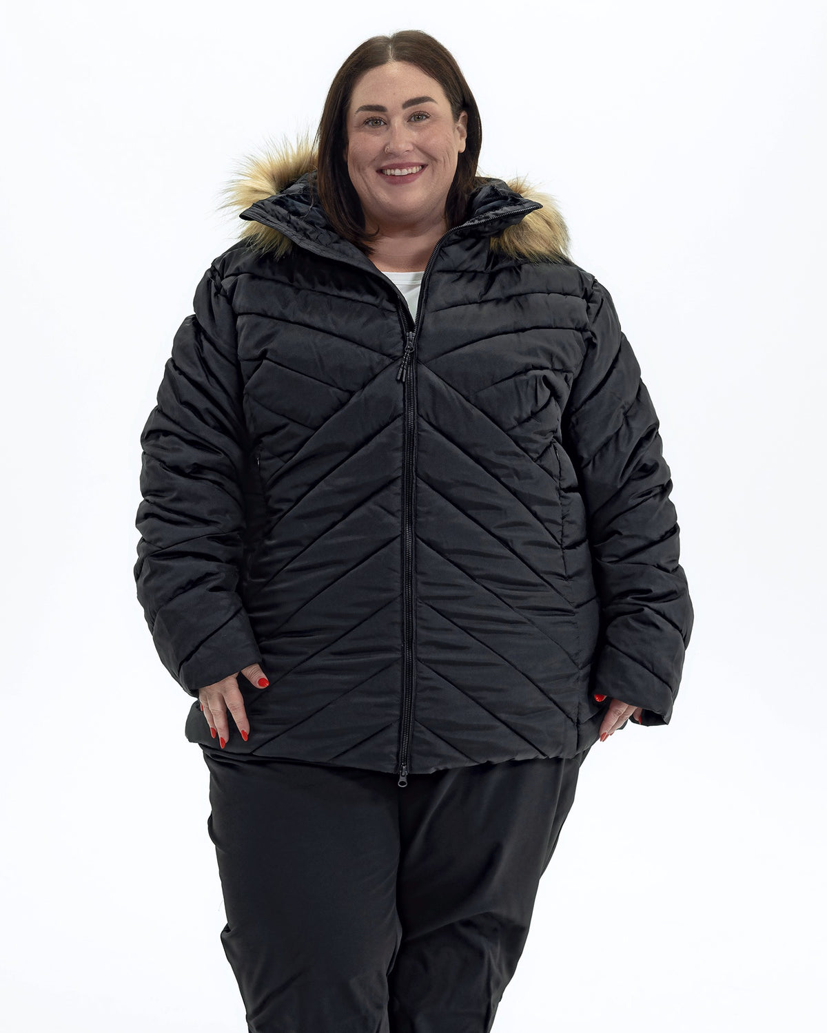 Black The Axtell plus size hooded winter parka, front | Model is 5'4" and wears a 3X