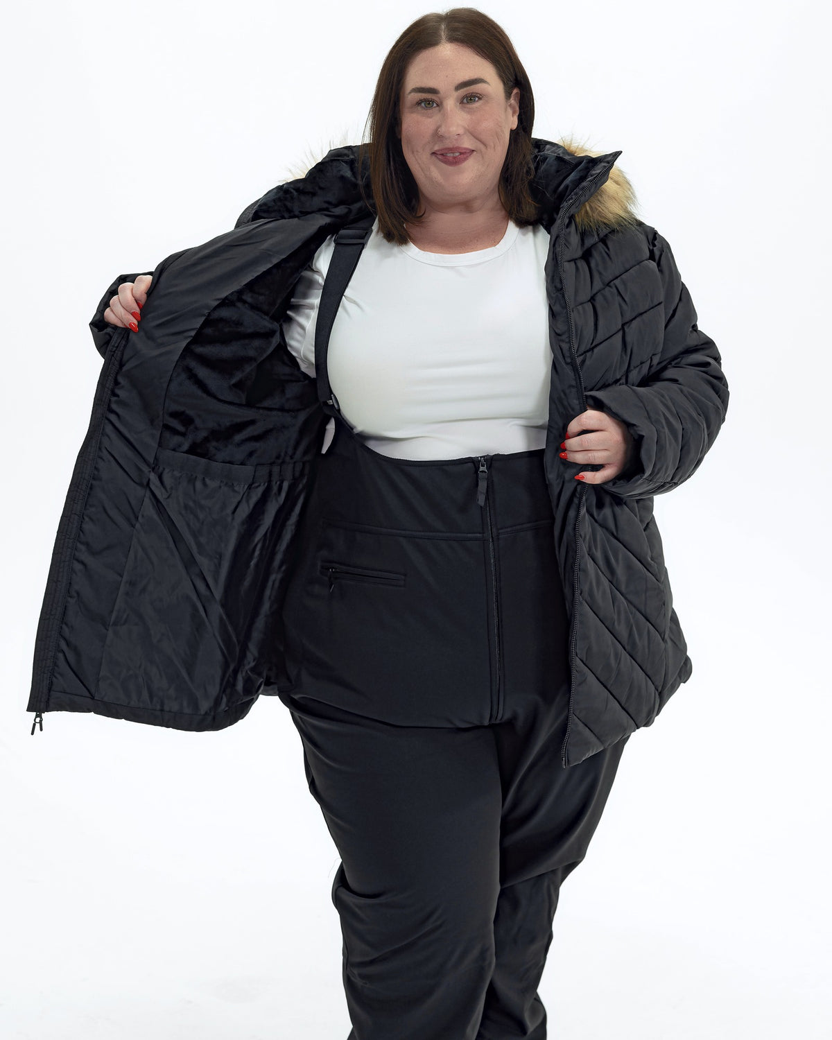 Black The Axtell plus size hooded winter parka, worn open showing the plush fleece lining | Model is 5'4" and wears a 3X