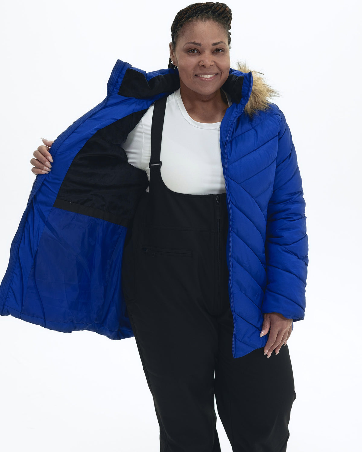 Midnight Blue The Axtell plus size hooded winter parka, worn open showing the plush fleece lining | Model is 5'6" and wears a 1X