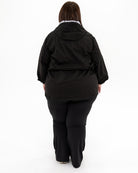 Plus size mystique rain jacket black 4 | Model is 5'4" and wears a 3X