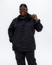 Plus size pod rain jacket black 1 | Model is 5'9" and wears a 3X