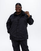 Plus size pod rain jacket black 1 | Model is 5'9" and wears a 3X