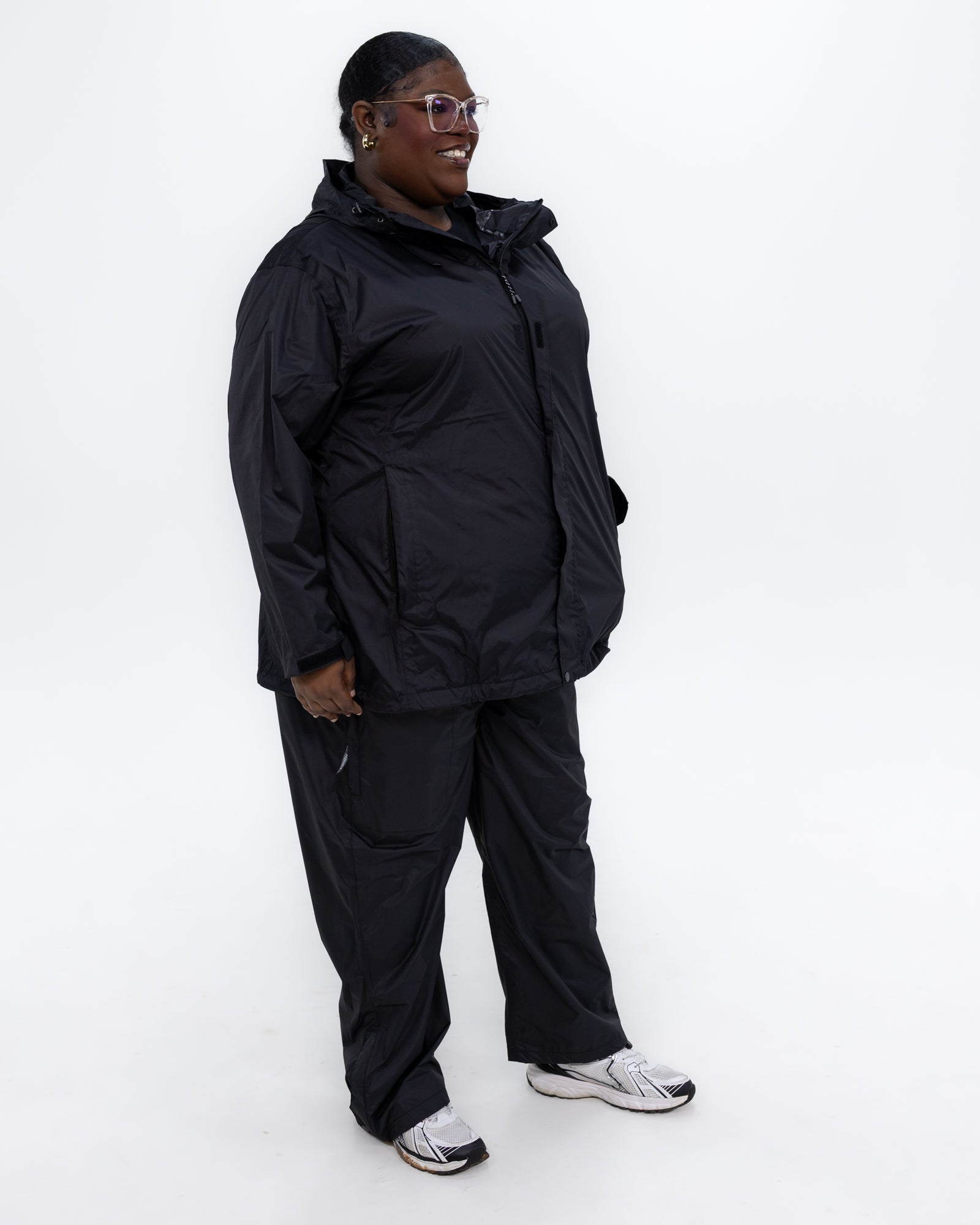 Plus size pod rain jacket black 2 | Model is 5'9" and wears a 3X