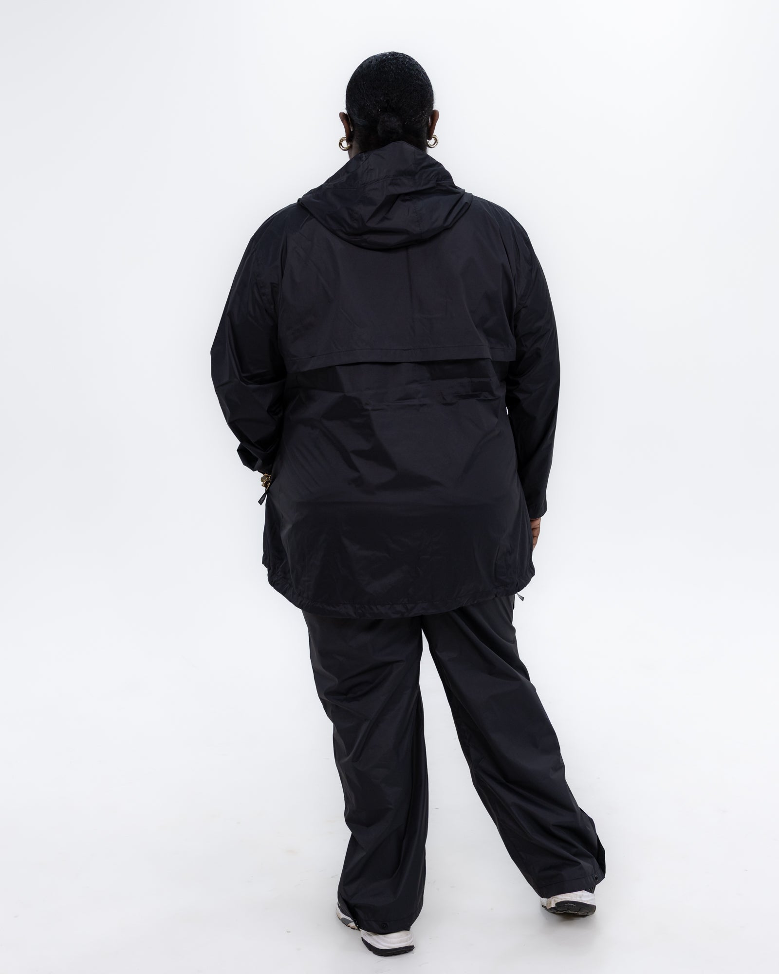 Plus size pod rain jacket black 3 | Model is 5'9" and wears a 3X
