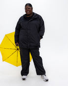 Plus size pod rain jacket black 8 | Model is 5'9" and wears a 3X