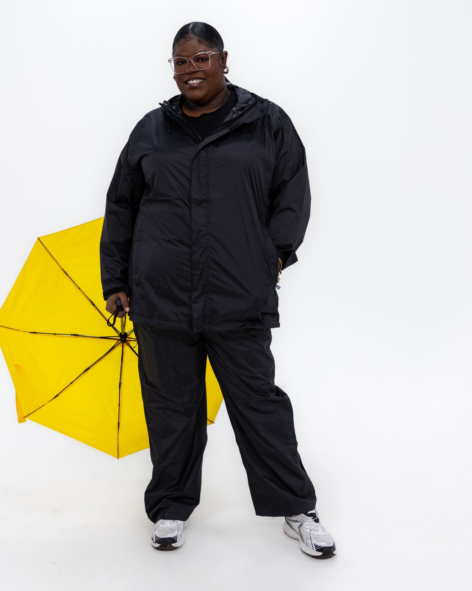 Plus size pod rain jacket black 8 | Model is 5'9" and wears a 3X