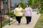 Plus size pod rain jacket lifestyle 1 all-groups