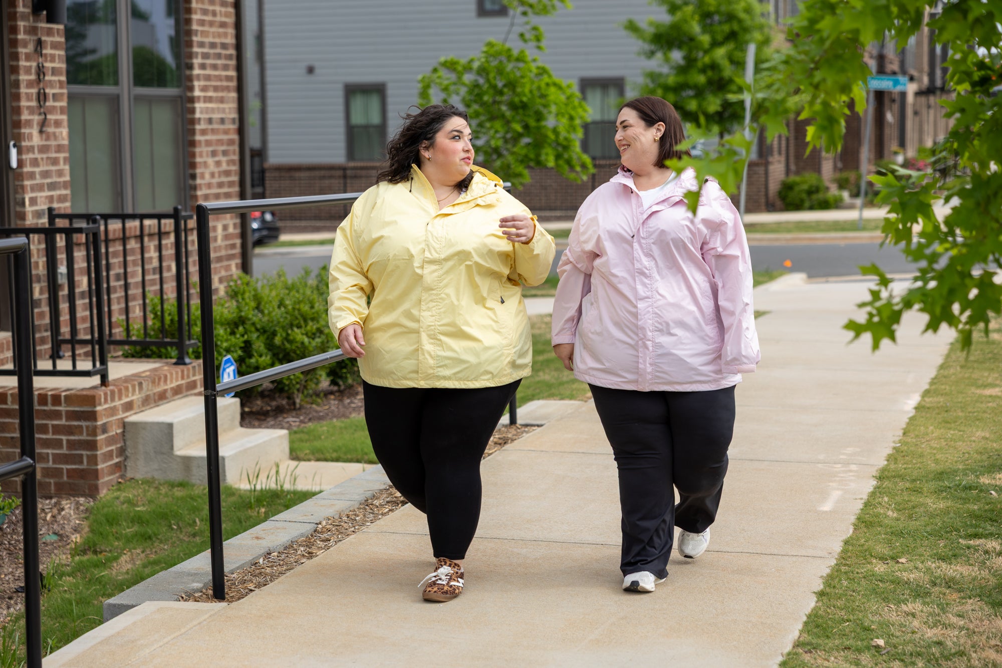 Plus size pod rain jacket lifestyle 1 all-groups