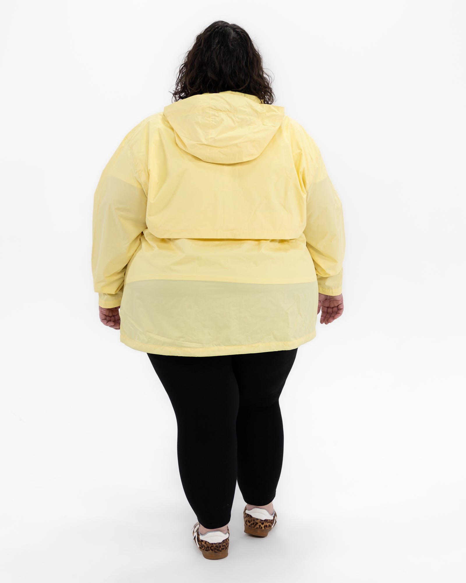 Plus size pod rain jacket yellow 10 | Model is 5'3" and wears a 5X