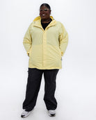 Plus size pod rain jacket yellow 2 | Model is 5'9" and wears a 3X