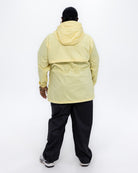 Plus size pod rain jacket yellow 4 | Model is 5'9" and wears a 3X