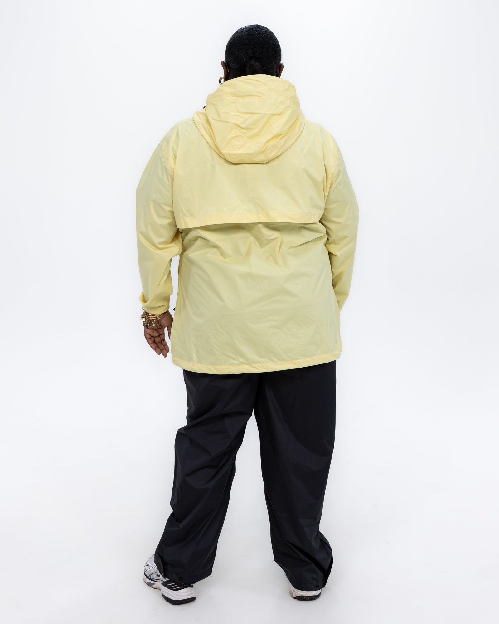 Plus size pod rain jacket yellow 4 | Model is 5'9" and wears a 3X