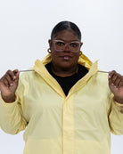 Plus size pod rain jacket yellow 5 | Model is 5'9" and wears a 3X