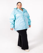 Plus size rain jacket powder blue 3 | Model is 5'3" and wears a 5X