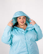 Plus size rain jacket powder blue 4 | Model is 5'3" and wears a 5X
