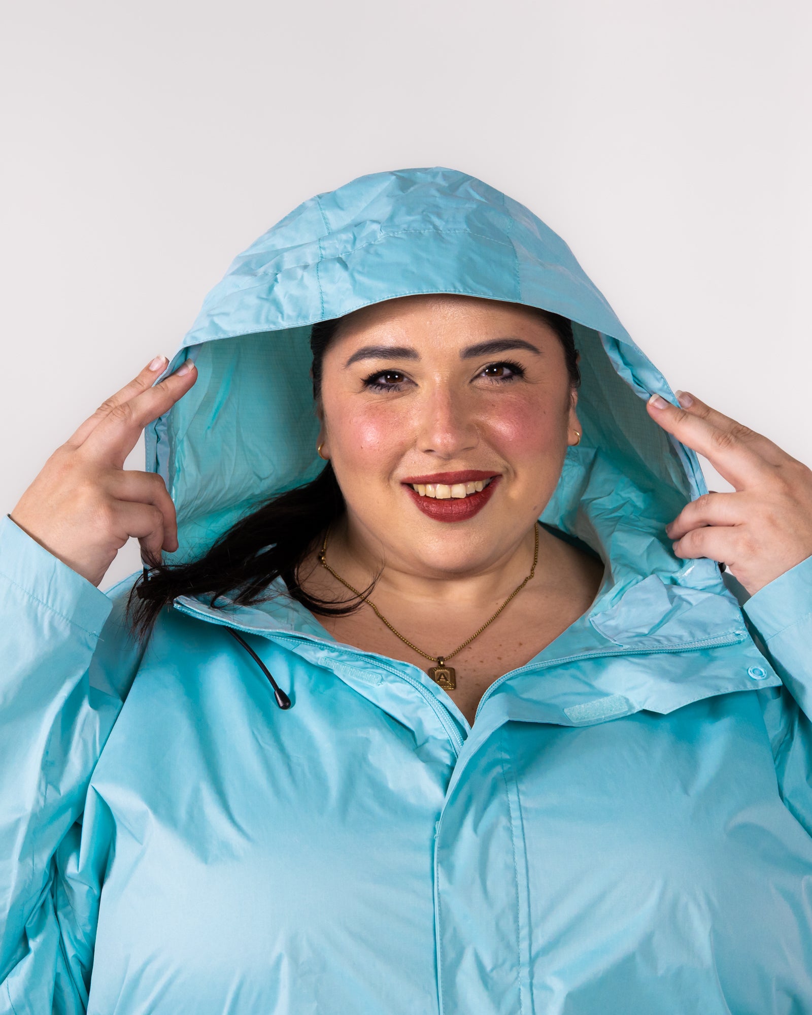 Plus size rain jacket powder blue 6 | Model is 5'3" and wears a 5X