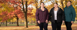 plus size women wearing plus size rain jackets and soft shell in fall 