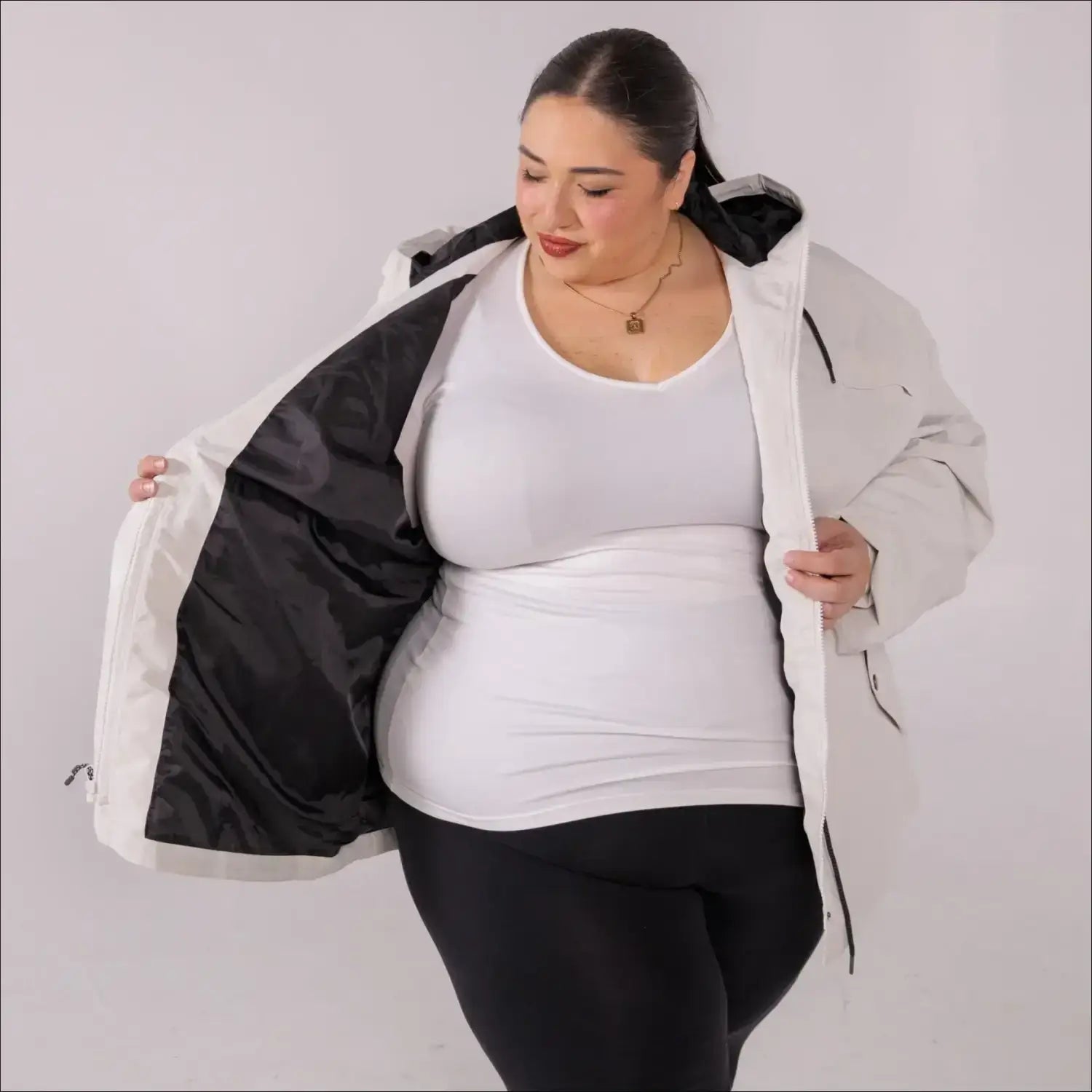 Beige plus size rain jacket on model, front image with inside showing