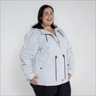 Beige plus size rain jacket on model, side image