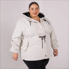 Beige plus size rain jacket on model, front image
