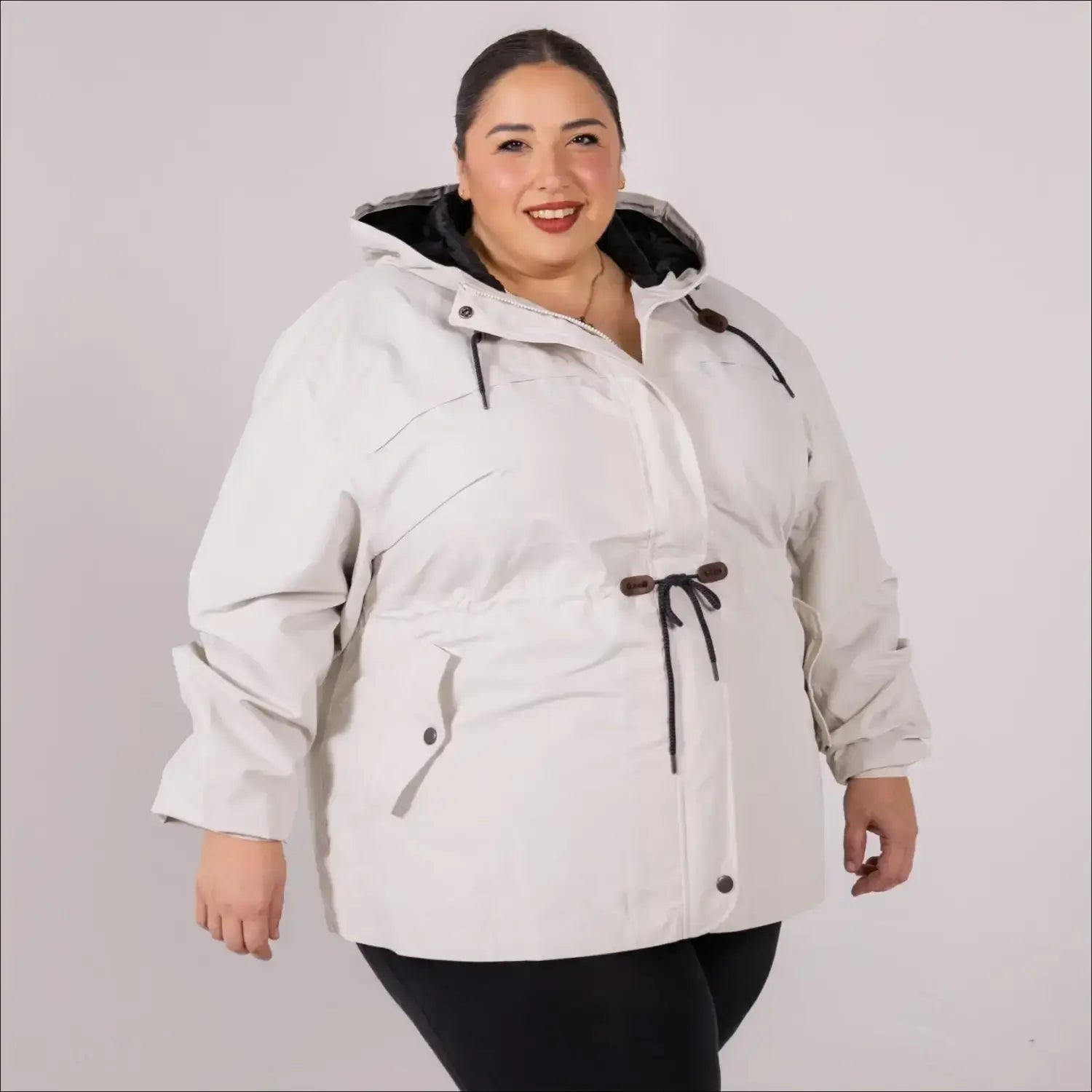 Beige plus size rain jacket on model, front image