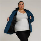 Blue plus size rain jacket on model, front image with inside showing