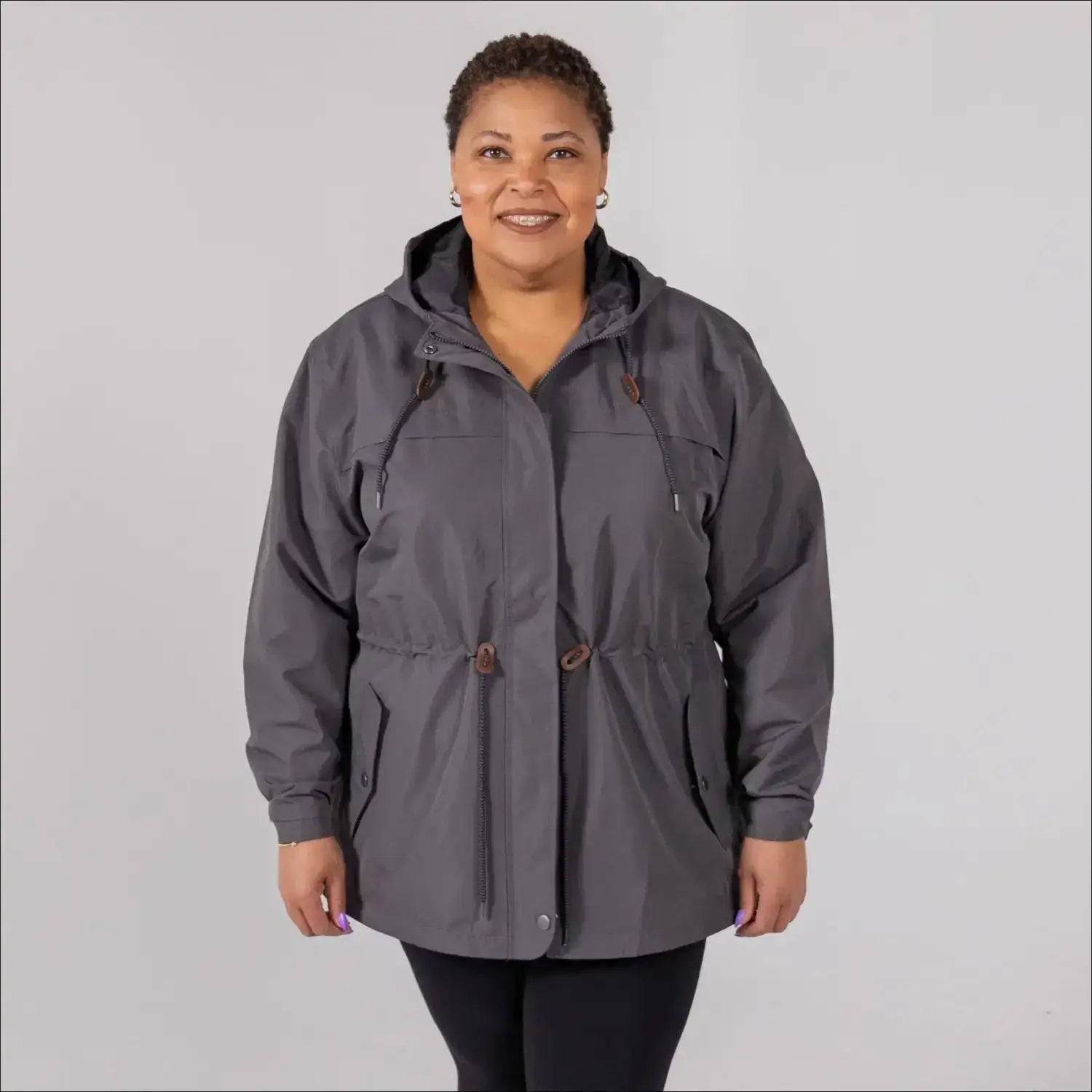 Gray plus size rain jacket on model, front image