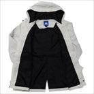 Flat lay of light-colored hooded rain jacket with black lining for plus size women