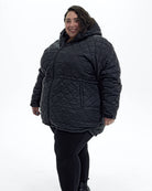 Black The Savvy II plus size quilted jacket, three quarter | Model is 5'4" and wears a 5X