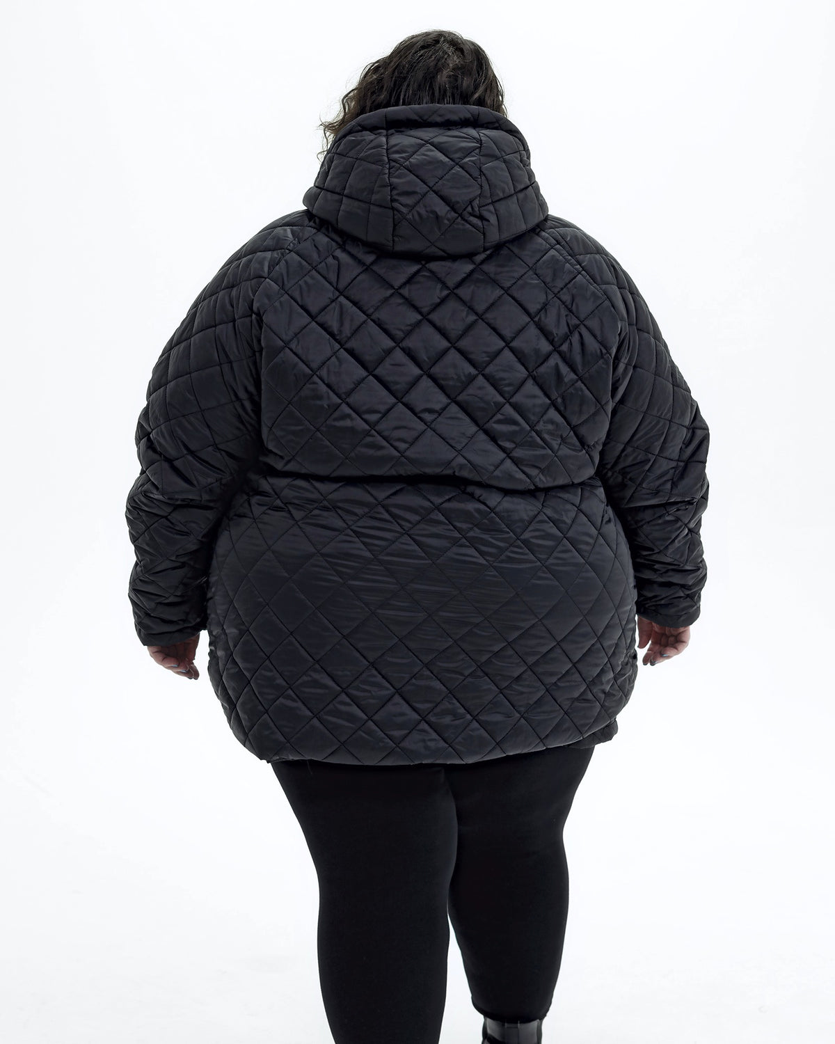 Black The Savvy II plus size quilted jacket, back | Model is 5'4" and wears a 5X