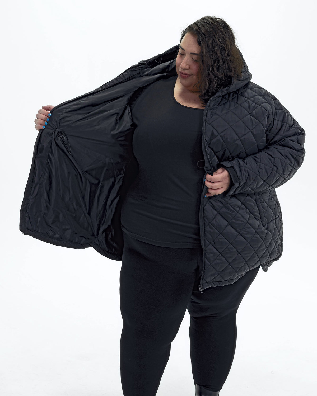Black The Savvy II plus size quilted jacket, worn open showing the lining | Model is 5'4" and wears a 5X