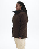 Chocolate The Siberian plus size heavy insulated softshell coat, side | Model is 5'6" and wears a 1X