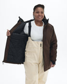 Chocolate The Siberian plus size heavy insulated softshell coat, worn open showing the quilted lining | Model is 5'6" and wears a 1X
