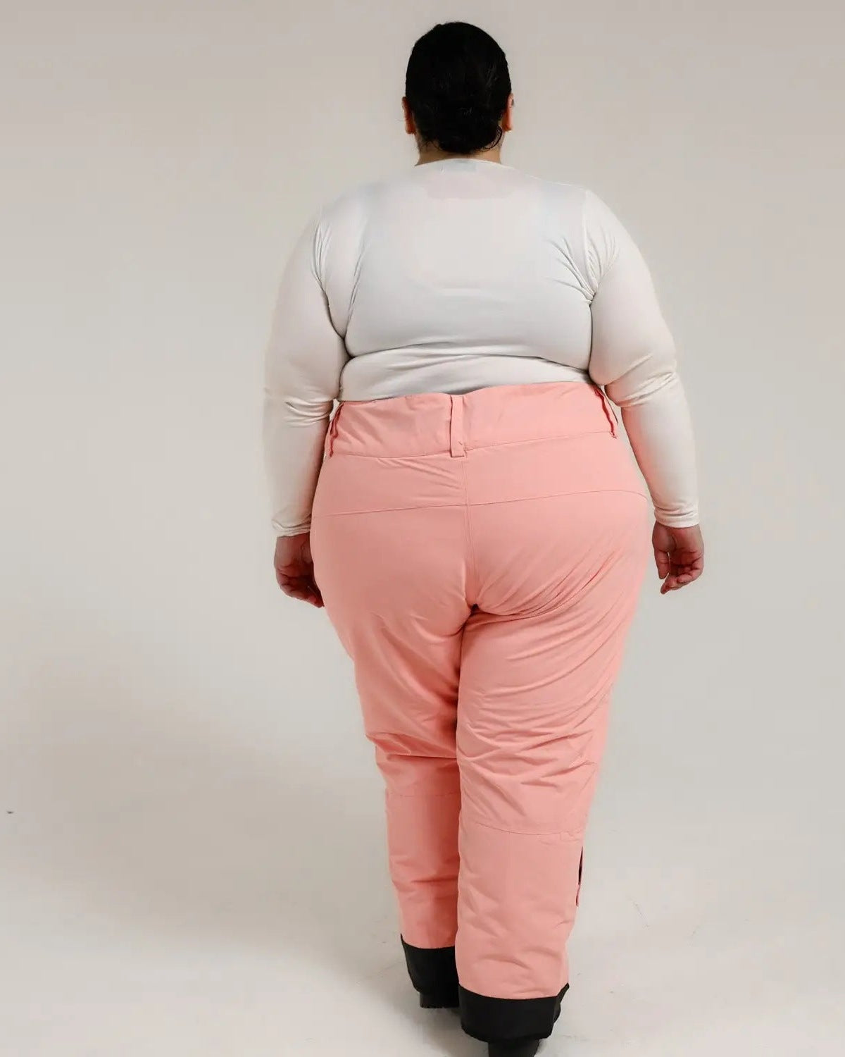Peach-colored snow pants from Snow Country Outerwear for women in plus size ski gear