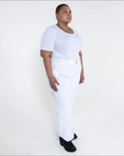 Woman in white outfit wearing Snow Country Plus Size Insulated Ski Pants