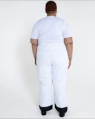 White ski pants with black cuffs from Snow Country Outerwear women’s plus size insulated ski pants