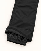 Black women's plus size insulated ski pants, sizes 1X to 6X, knee pocket and snow cuff detail