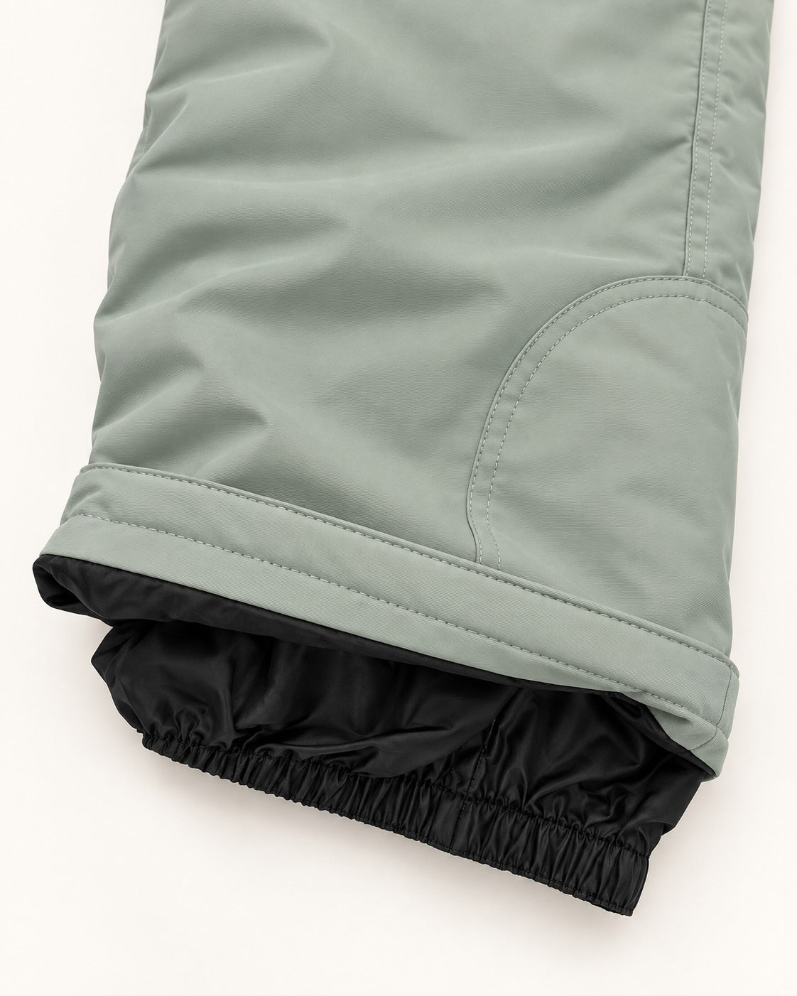 Green Lily women's plus size Vertex snow bib overalls, sizes 1X to 6X, inner leg scuff guard and elastic snow gaiter detail