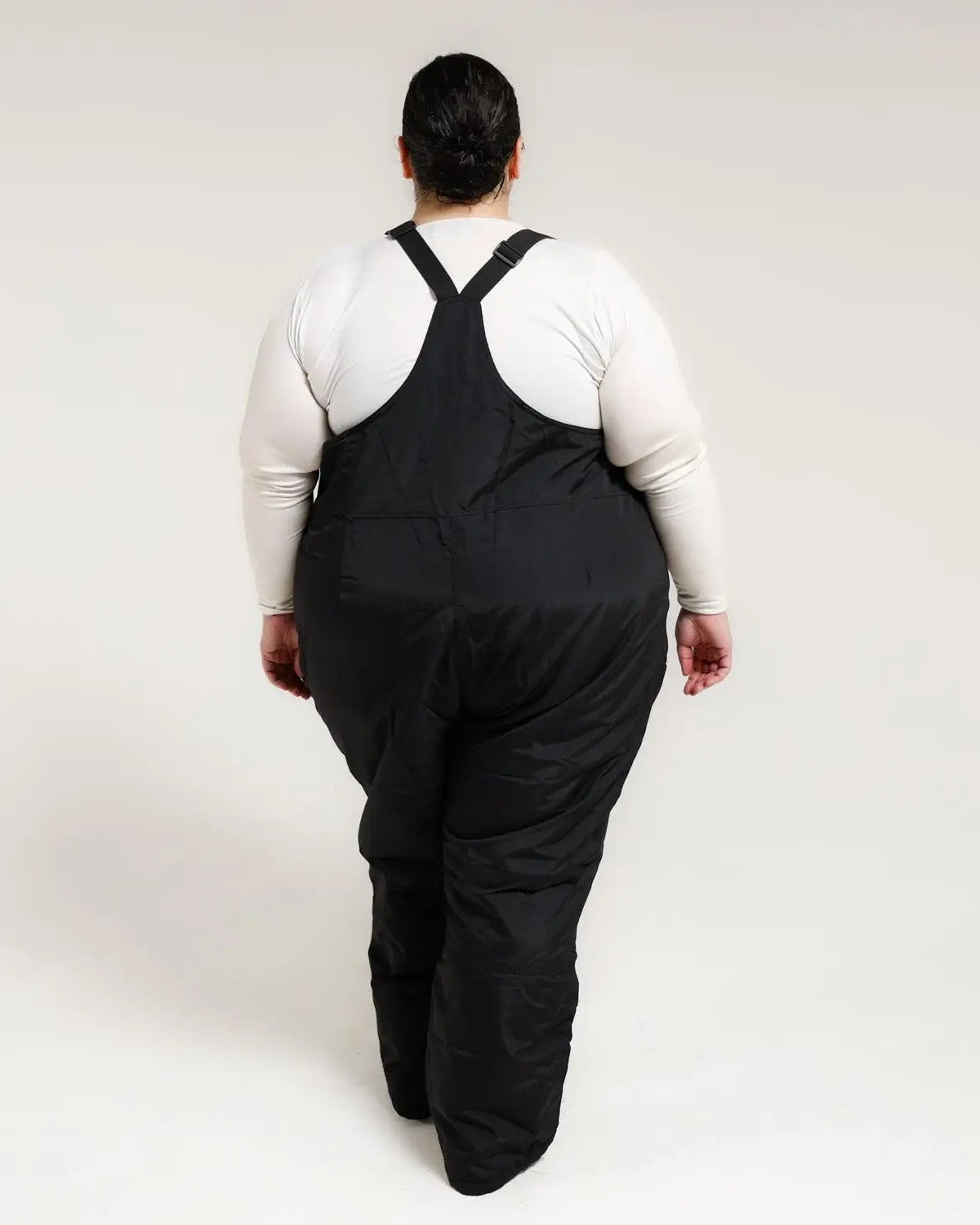 Black snow bib overalls from Snow Country Outerwear Women’s Plus Size Vertex Winter Ski Bibs