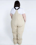 Beige plus-size snow bib overalls from Snow Country Outerwear Women’s Vertex collection